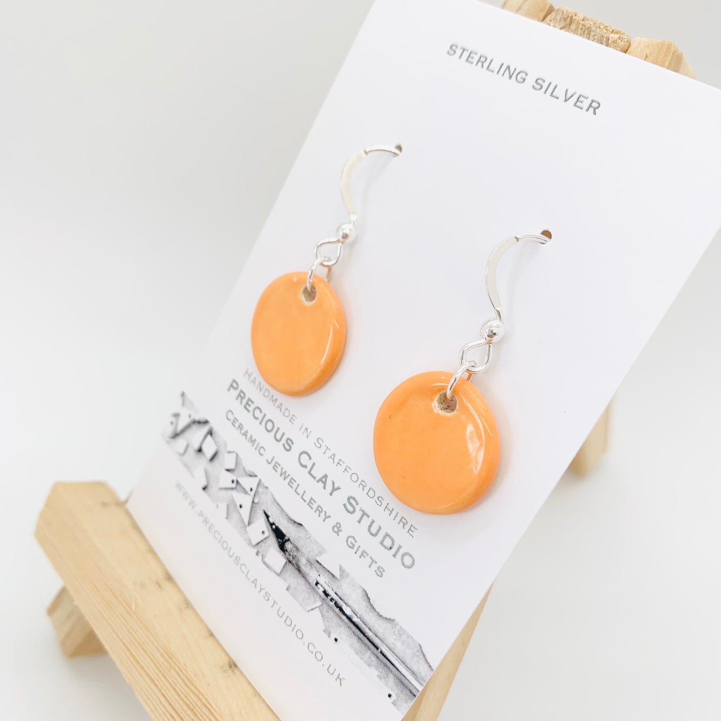 Orange circle drop- sterling silver