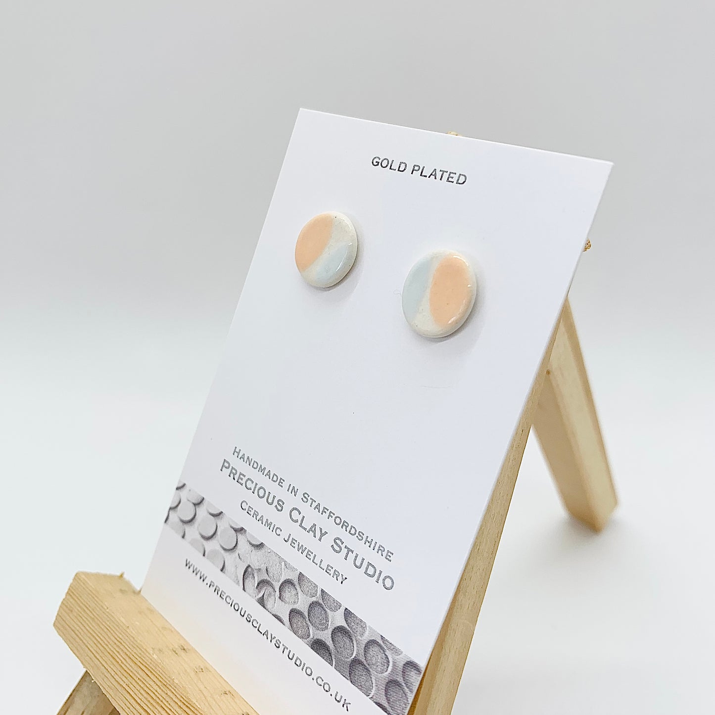 Peach blue circle studs