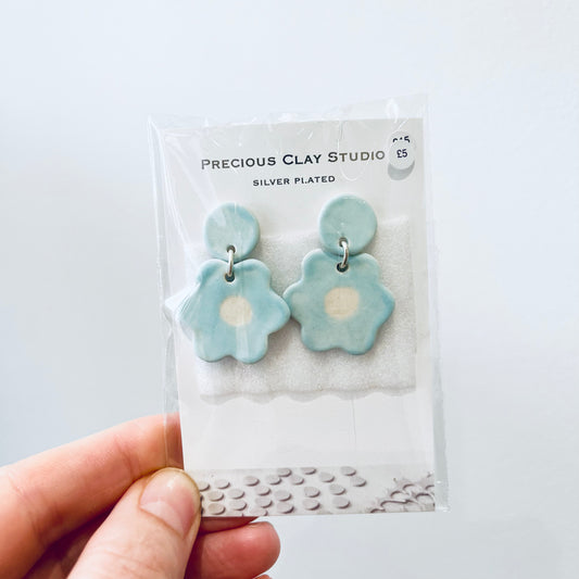 Blue flower stud-drop